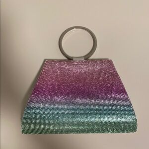 INC clutch/formal bag silver back and multicolor front.